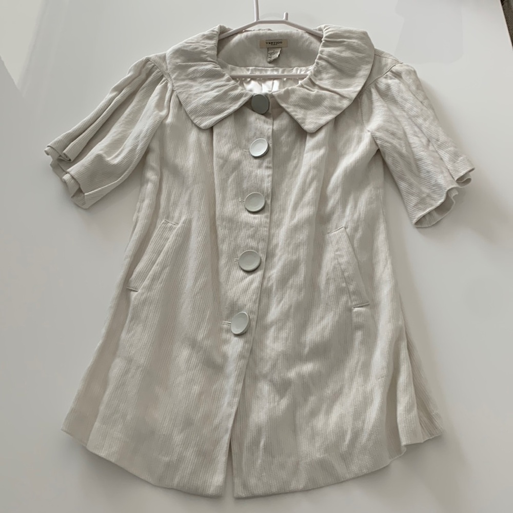 White shirt sleeve buttoned down shirt